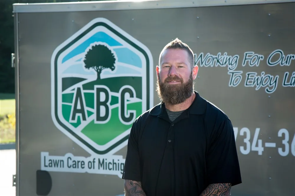 ABC Lawn Care of Michigan crew on a client property